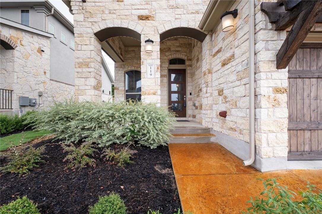 View 119 Cartwheel BND in Rough Hollow 119 Cartwheel BND - front exterior - Luxury home in Rough Hollow, Austin, TX