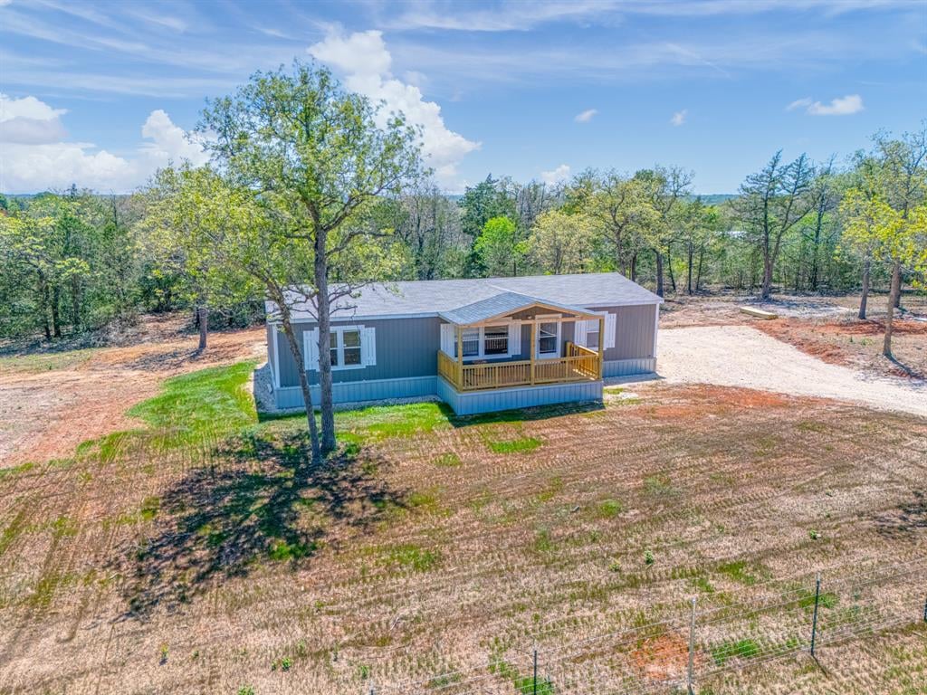 View 119 Milam Ln Unit #A in JEWEL AND BETTY BANKS SUBDIVISION 119 Milam Ln Unit #A - front exterior - Luxury home in JEWEL AND BETTY BANKS SUBDIVISION, Bastrop, TX