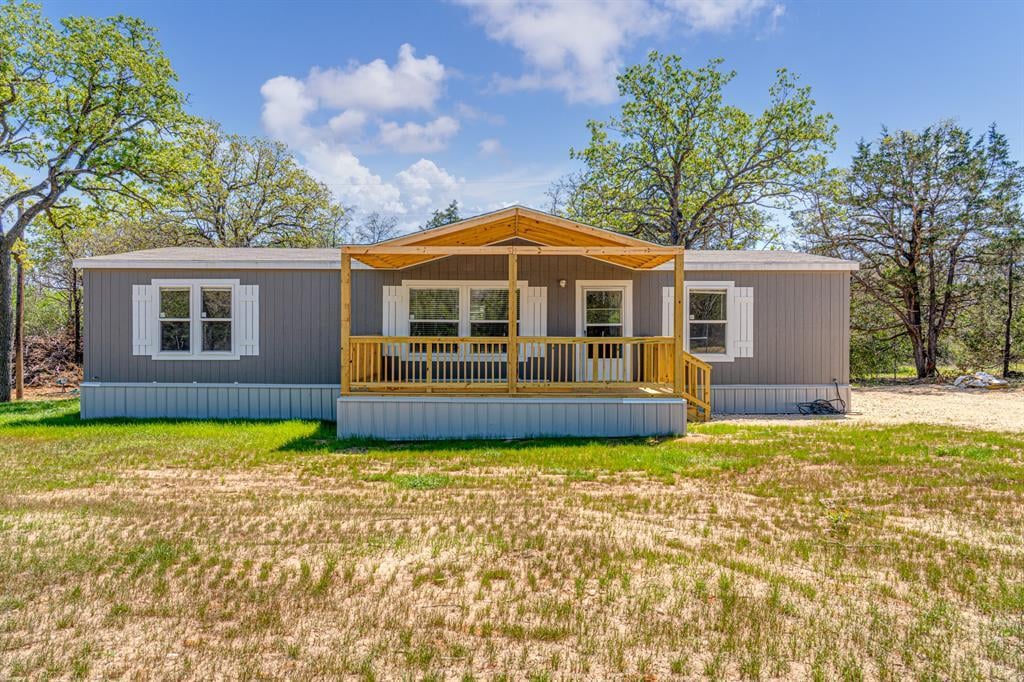 View 119 Milam Ln Unit #B in And Betty Banks 119 Milam Ln Unit #B - front exterior - Luxury home in And Betty Banks, Bastrop, TX