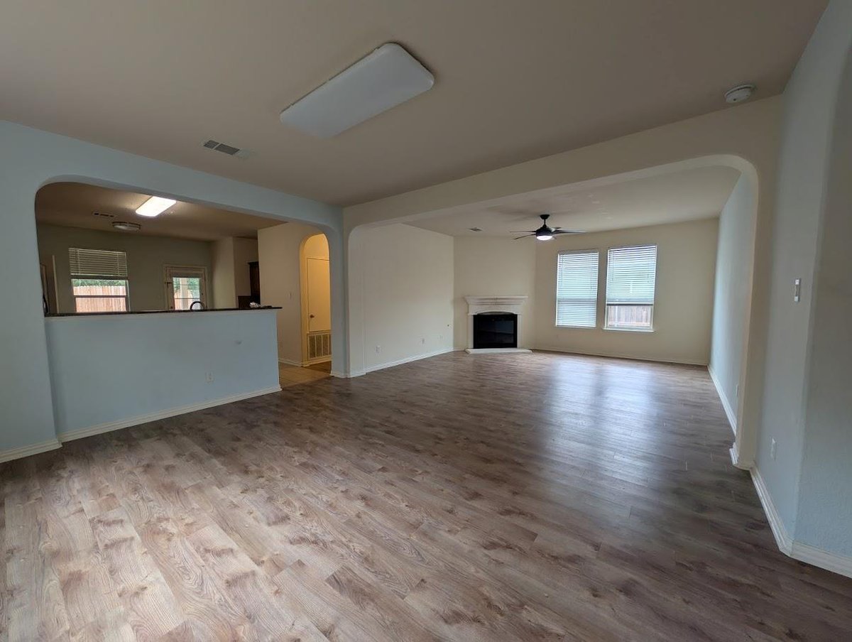 Living area at 11901 Buzz Schneider Ln - 5 bed 3 bath home