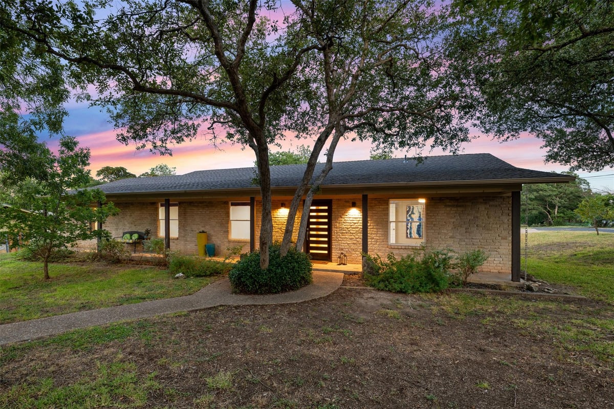 View 11905 Hornsby St in Spanish Oak Ridge Sec 01 11905 Hornsby St - front exterior - Luxury home in Spanish Oak Ridge Sec 01, Austin, TX