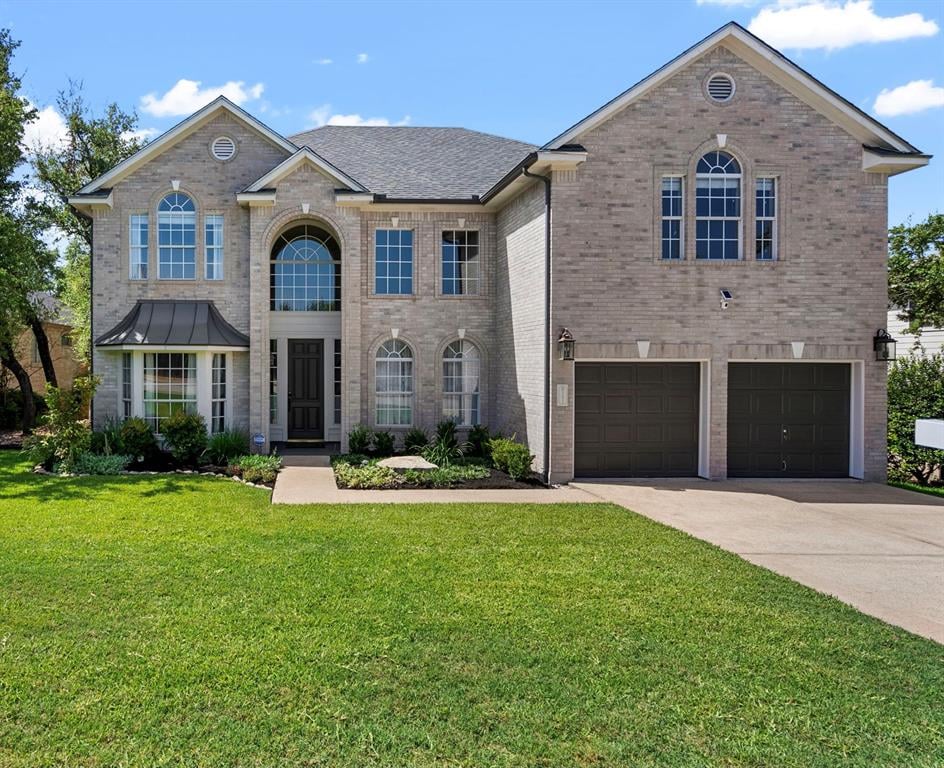 View 11913 Lake Stone DR in Lake Pointe Sec 05 11913 Lake Stone DR - front exterior - Luxury home in Lake Pointe Sec 05, Austin, TX