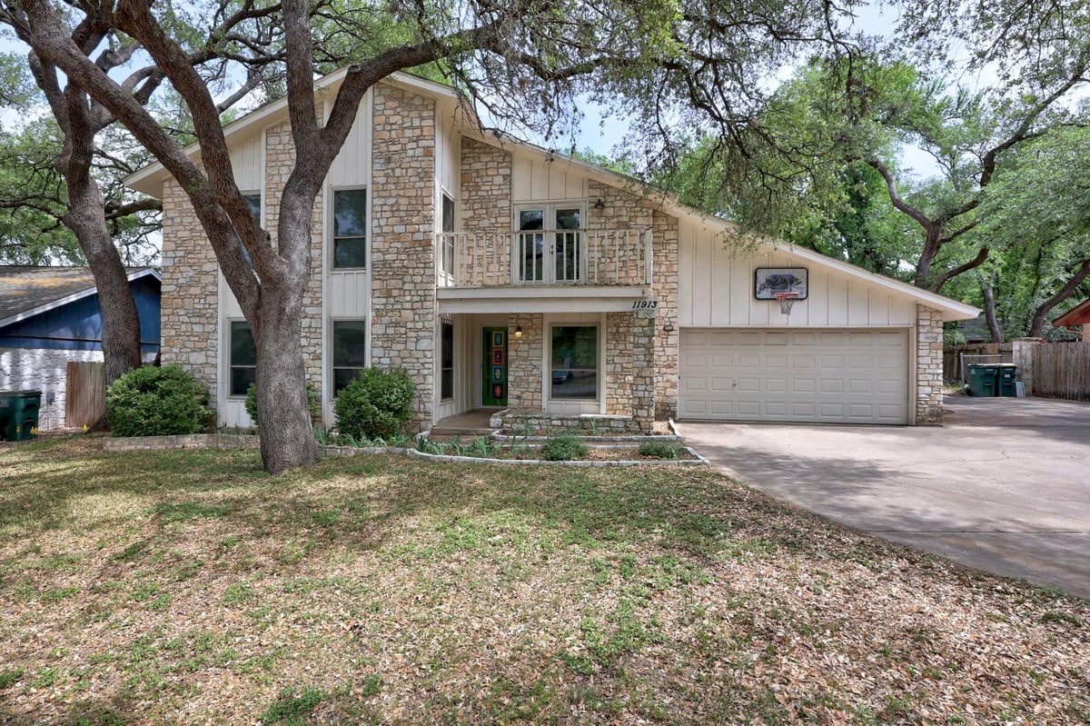 View 11913 Millwright Pkwy in Woodland Village Anderson Mill Sec 02 Ph 01 11913 Millwright Pkwy - front exterior - Luxury home in Woodland Village Anderson Mill Sec 02 Ph 01, Austin, TX