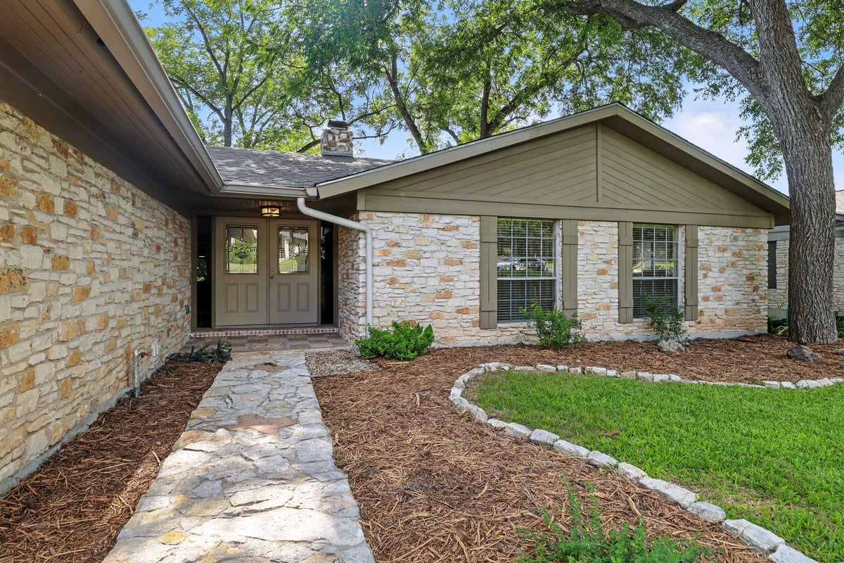 Primary bedroom at 11915 River Oaks Trl - 3 bed 2 bath home