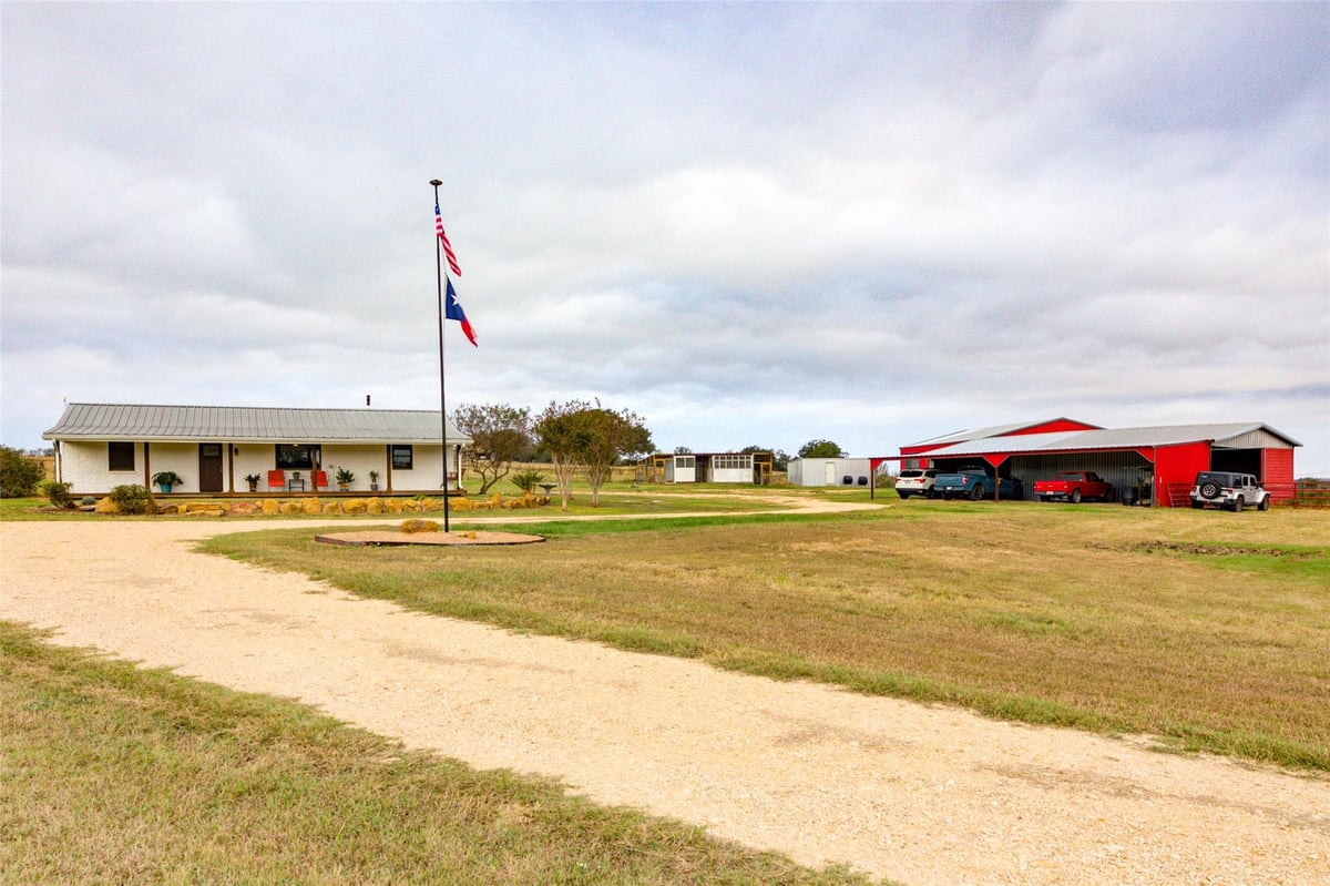 View 1192 Sand Hill RD in Isaac Campbell Surv A-79 1192 Sand Hill RD - property photo 1 - Luxury home in Isaac Campbell Surv A-79, Dale, TX
