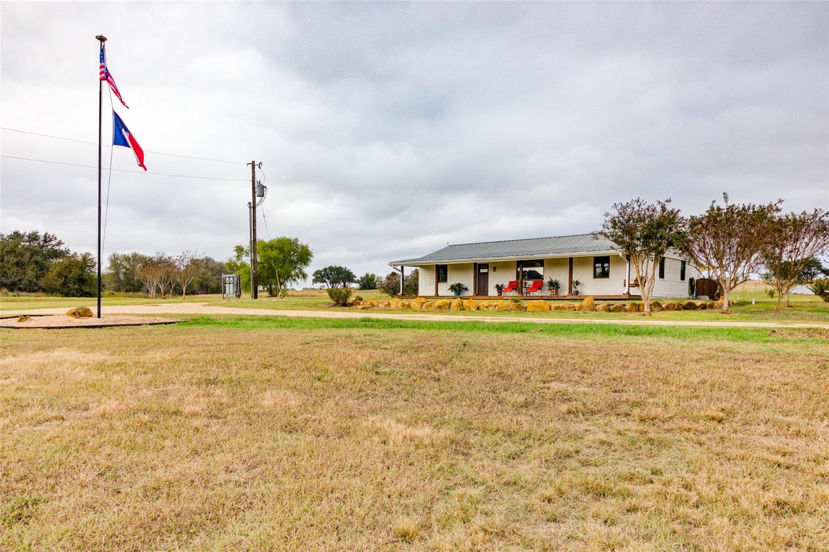 View 1192 Sand Hill Rd in Isaac Campbell Surv A-79 1192 Sand Hill Rd - front exterior - Luxury home in Isaac Campbell Surv A-79, Dale, TX