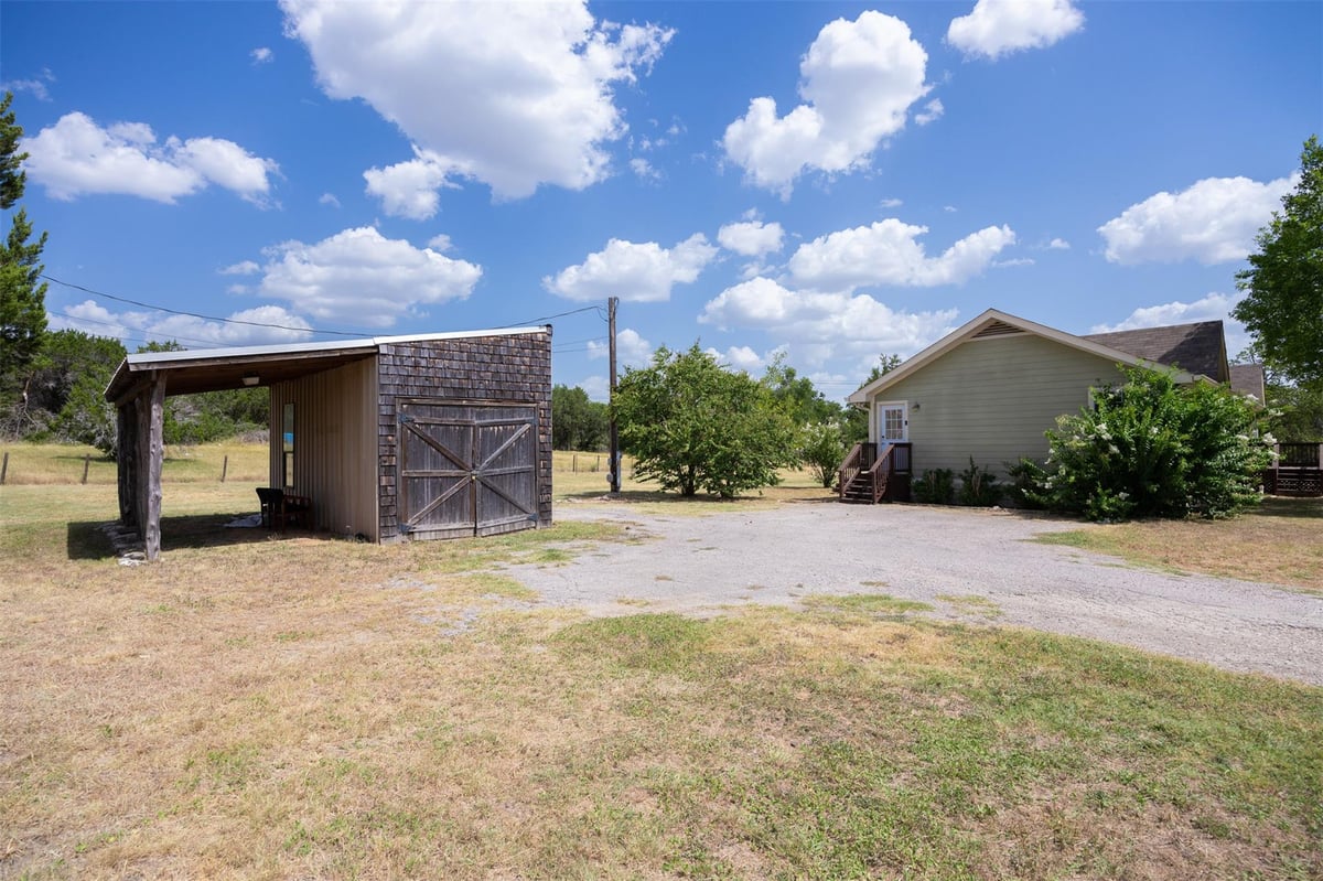 11929 Fitzhugh Corners - front exterior - Luxury home in Fitzhugh Corners, Dripping Springs, TX