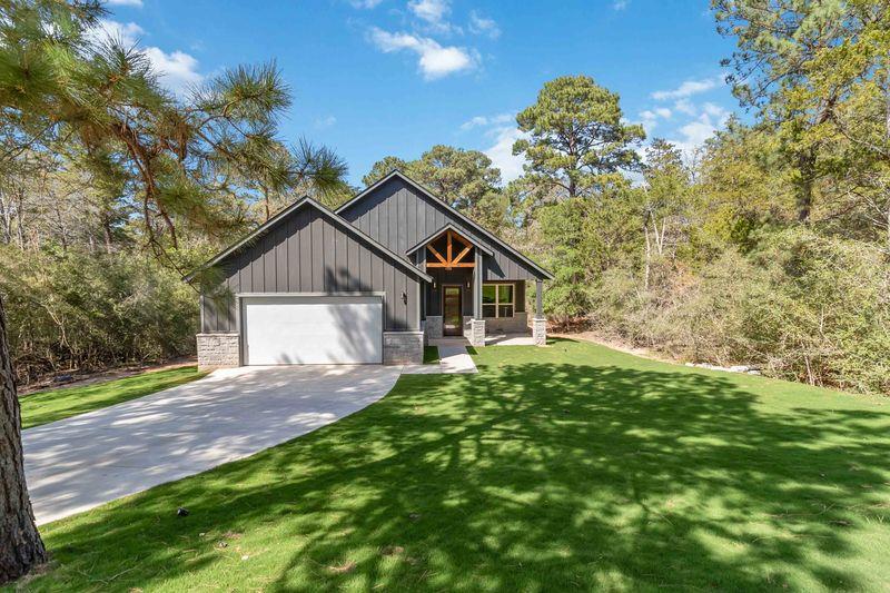 View 120 Anahulu Ln in Tahitian Village, 120 Anahulu Ln - front exterior - Luxury home in Tahitian Village,, Bastrop, TX