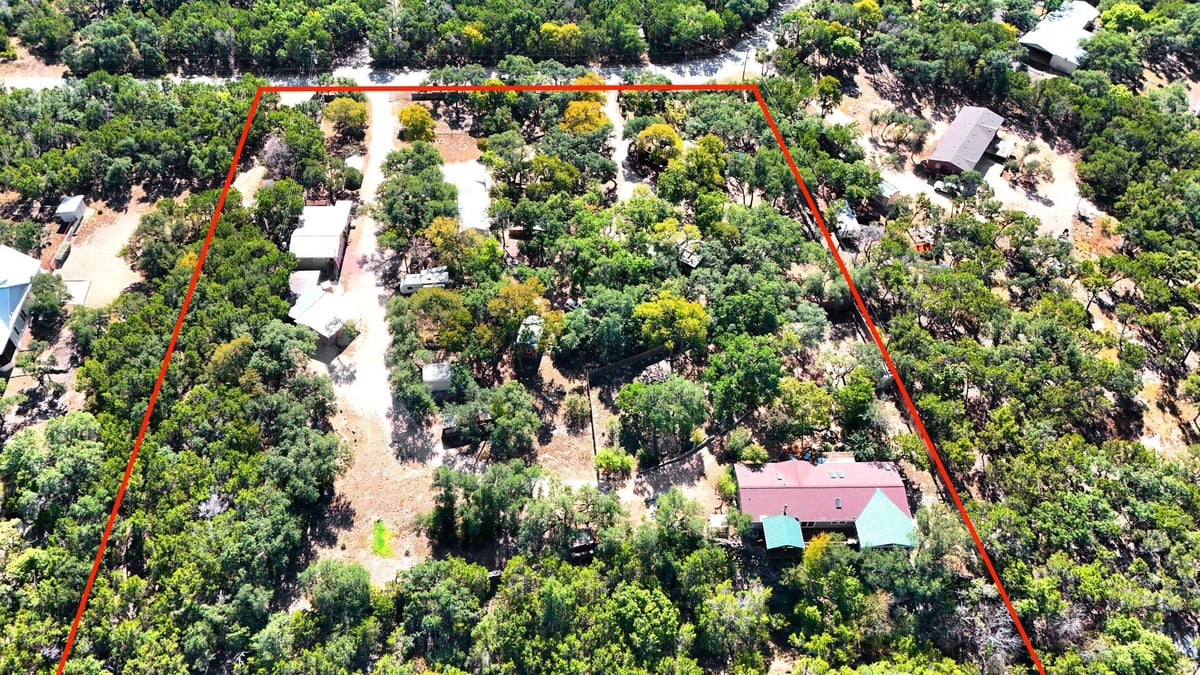 View 120 Cedar Bend Rd in Burnett Ranch Sec 2 120 Cedar Bend Rd - front exterior - Luxury home in Burnett Ranch Sec 2, Wimberley, TX