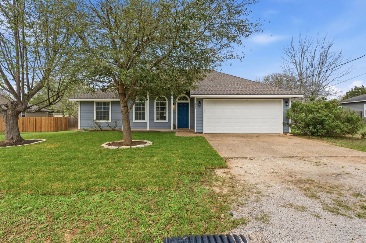 View 120 Kokomo Ln in Tahitian Village 120 Kokomo Ln - front exterior - Luxury home in Tahitian Village, Bastrop, TX