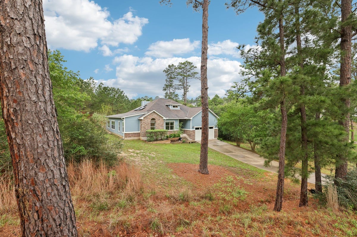 View 120 Pukoo Dr in Tahitian Village 120 Pukoo Dr - front exterior - Luxury home in Tahitian Village, Bastrop, TX