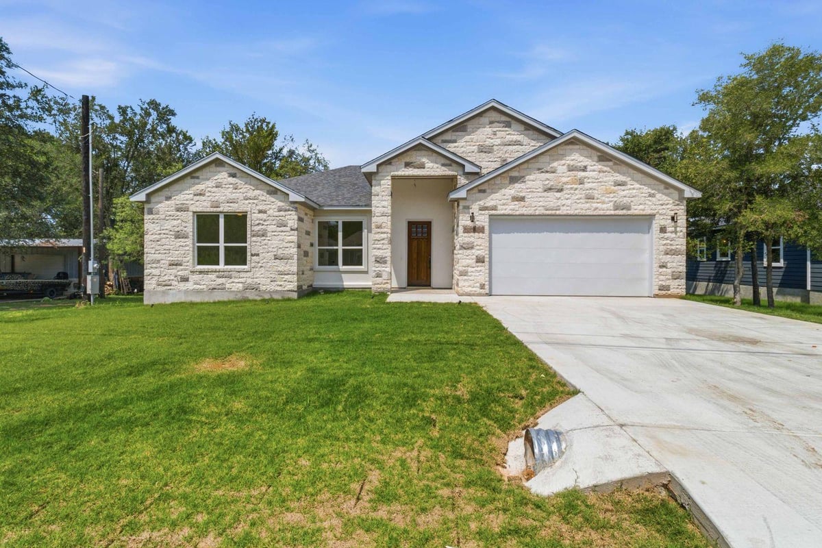View 120 Puu Waa Waa LN in Tahitian Village, 120 Puu Waa Waa LN - front exterior - Luxury home in Tahitian Village,, Bastrop, TX