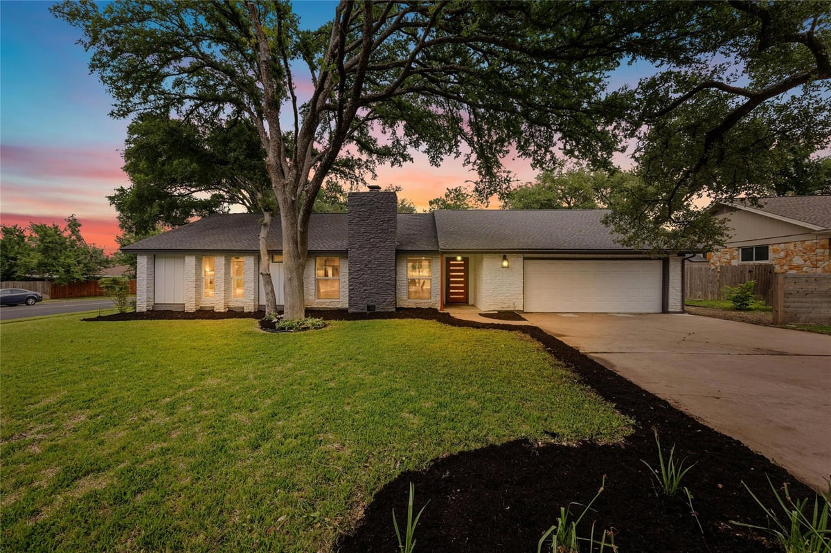 View 12003 Millwright Pkwy in Woodland Village Anderson Mill Sec 02 Ph 01 12003 Millwright Pkwy - front exterior - Luxury home in Woodland Village Anderson Mill Sec 02 Ph 01, Austin, TX