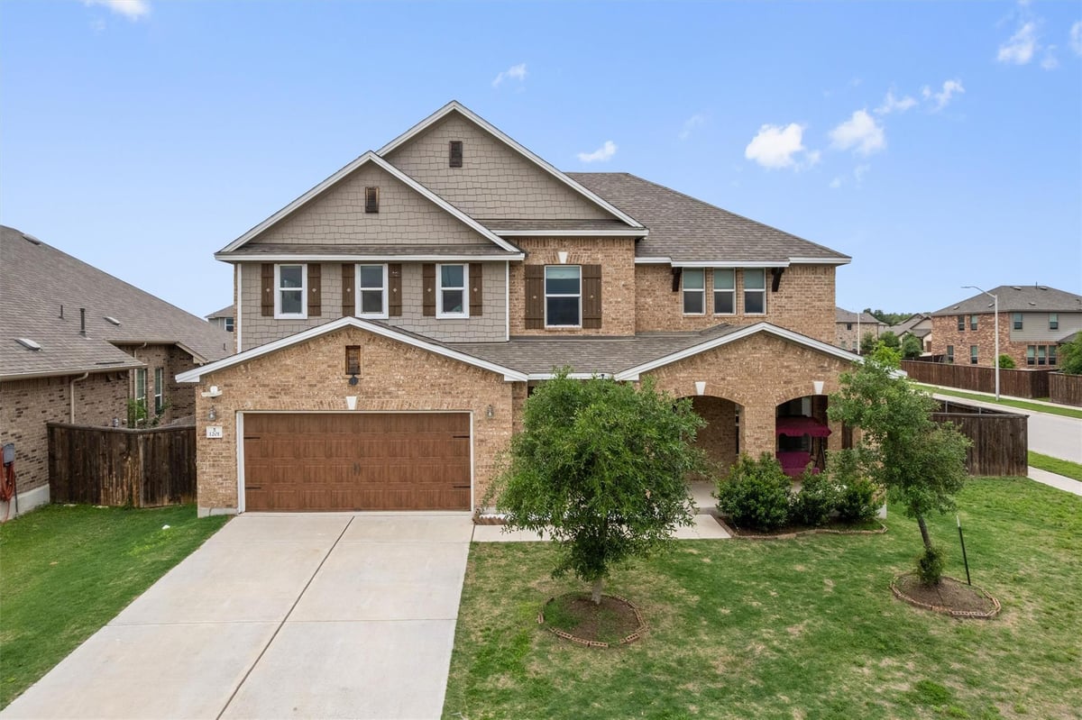 View 1201 Euless Ln in Mason Ranch Ph 1 Sec 9 1201 Euless Ln - front exterior - Luxury home in Mason Ranch Ph 1 Sec 9, Leander, TX
