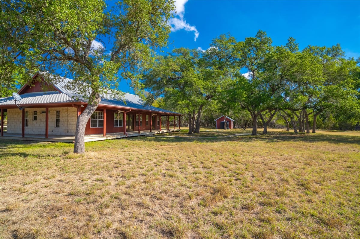 View 1201 Sandy Point Rd in Burnett Ranch Sec 2 1201 Sandy Point Rd - property photo 1 - Luxury home in Burnett Ranch Sec 2, Wimberley, TX