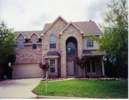 View 1202 Mayan Way in AUSTIN LAKE HILLS SEC 2 1202 Mayan Way - front exterior - Luxury home in AUSTIN LAKE HILLS SEC 2, Austin, TX