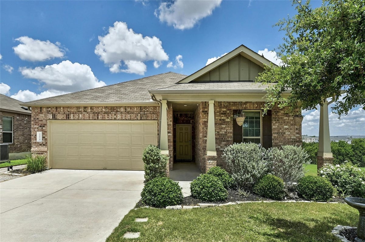View 12028 Reedsport Trl in Bellingham Mdws Sec 2 12028 Reedsport Trl - front exterior - Luxury home in Bellingham Mdws Sec 2, Austin, TX