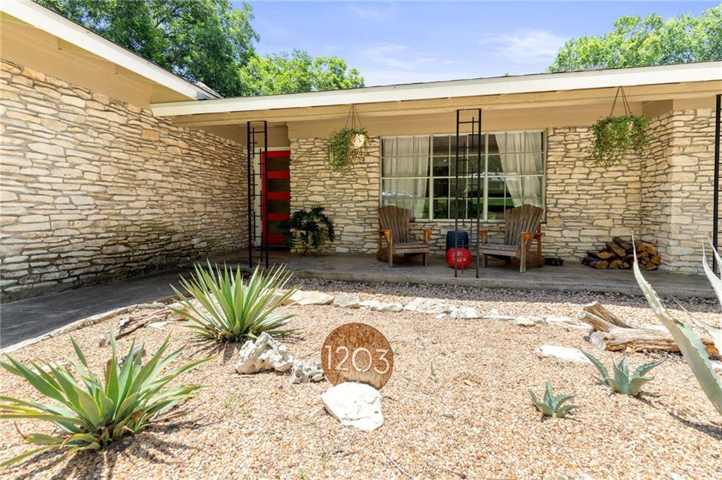 View 1203 Newport Ave in North Acres Sec 01 1203 Newport Ave - front exterior - Luxury home in North Acres Sec 01, Austin, TX