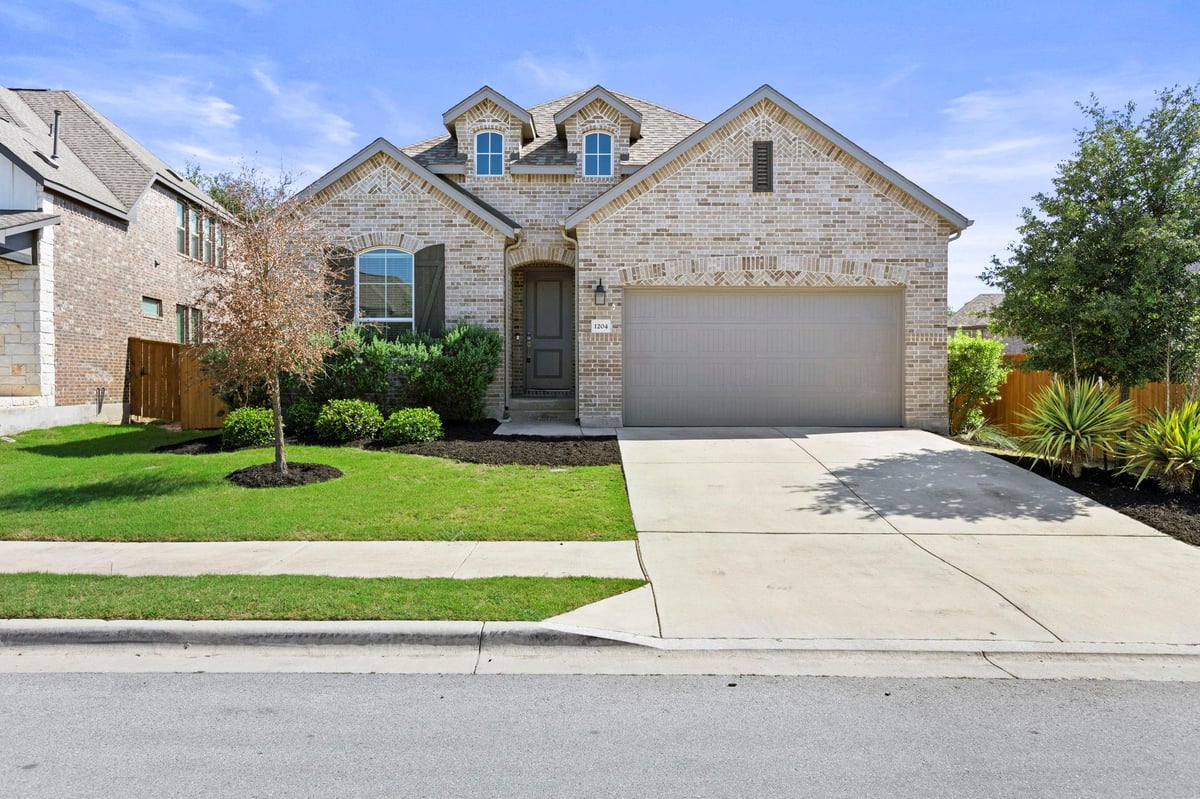 1204 Texas Ash LN - front exterior - Luxury home in Parkside on the River, Georgetown, TX