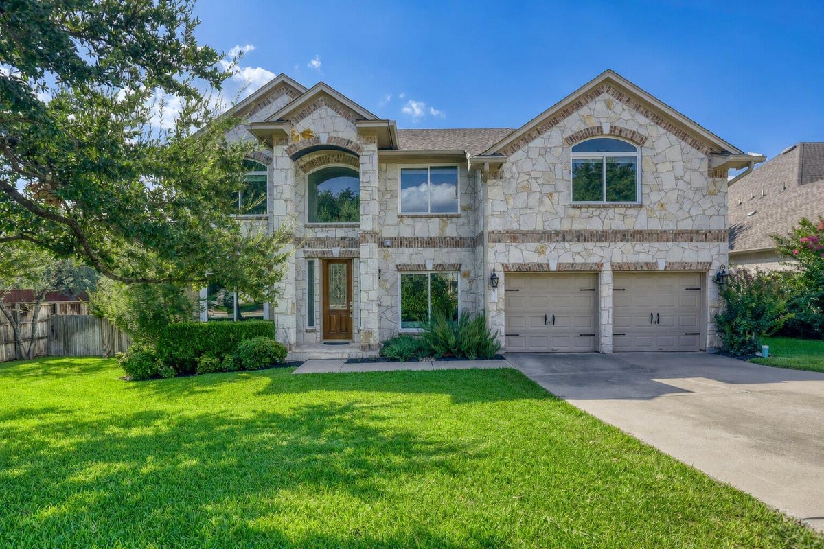 View 12052 Tulare DR in Lake Pointe 12052 Tulare DR - property photo 1 - Luxury home in Lake Pointe, Austin, TX