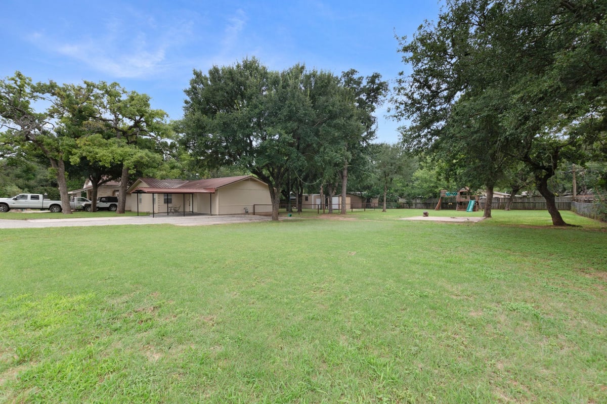 View 1206 Sherrard ST in OAKS ADDITION 1206 Sherrard ST - front exterior - Luxury home in OAKS ADDITION, Burnet, TX