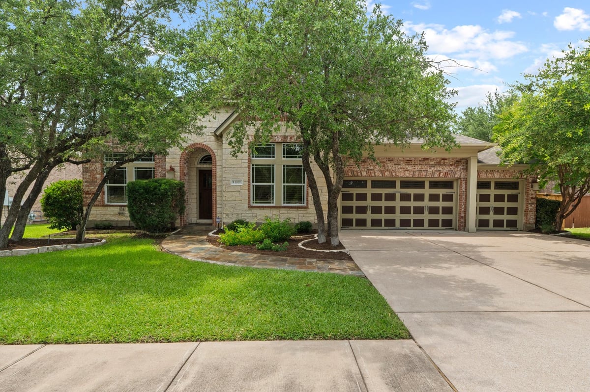 View 1207 Quiet Creek DR in Red Oaks Sec 2 1207 Quiet Creek DR - front exterior - Luxury home in Red Oaks Sec 2, Cedar Park, TX