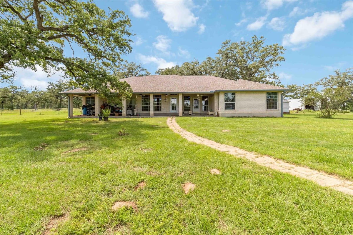View 1208 Jeddo RD in Kuykendall, John 1208 Jeddo RD - front exterior - Luxury home in Kuykendall, John, Rosanky, TX