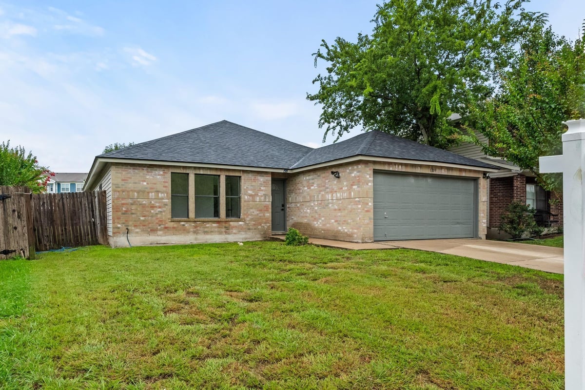View 1209 Bradbury Ln in Harris Ridge Ph 03 Sec 01-A 1209 Bradbury Ln - front exterior - Luxury home in Harris Ridge Ph 03 Sec 01-A, Austin, TX