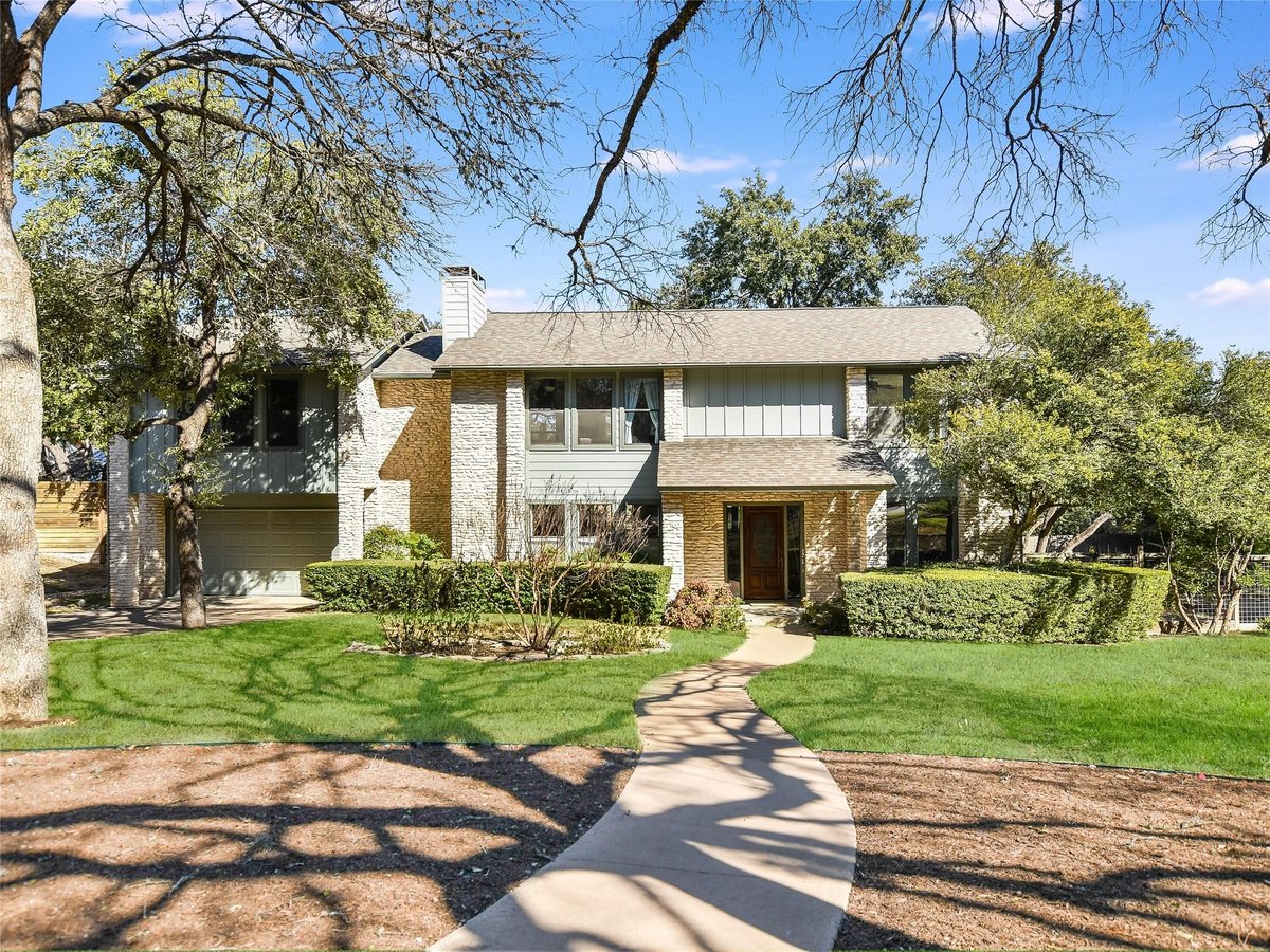 View 1209 Wilderness Dr in Beecave Woods Sec 01 1209 Wilderness Dr - front exterior - Luxury home in Beecave Woods Sec 01, Austin, TX