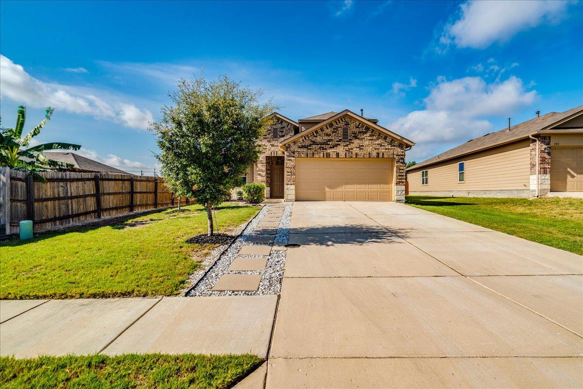 View 121 Coleto Creek LOOP in Creekside Village 121 Coleto Creek LOOP - property photo 1 - Luxury home in Creekside Village, Kyle, TX