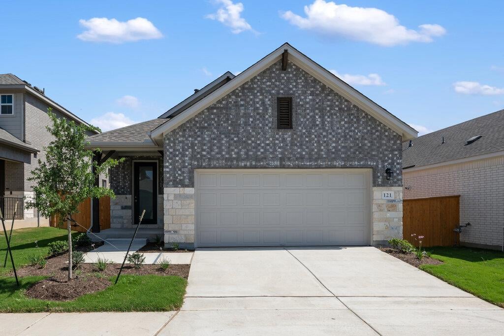 View 121 Knockout Rose Dr in La Cima 121 Knockout Rose Dr - front exterior - Luxury home in La Cima, San Marcos, TX