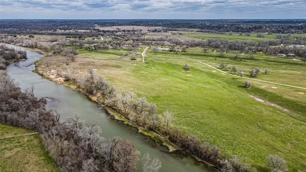 Primary bedroom at 121 Mechelle St - Doty River Estates, Smithville, TX