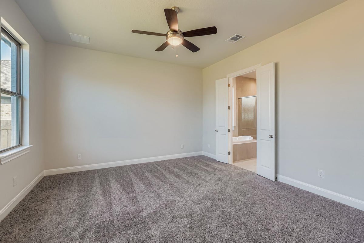 Primary bedroom at 121 Prickly Poppy Loop - 4 bed 3 bath home