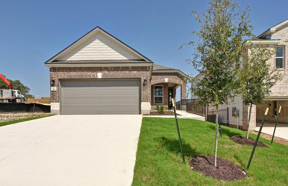 View 12106 Cantabria Rd in Creekside at Estancia 12106 Cantabria Rd - front exterior - Luxury home in Creekside at Estancia, Austin, TX