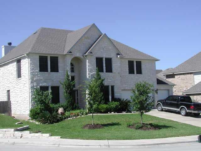 View 12107 Carlsbad DR in Lake Pointe Ph 04-a 12107 Carlsbad DR - front exterior - Luxury home in Lake Pointe Ph 04-a, Austin, TX