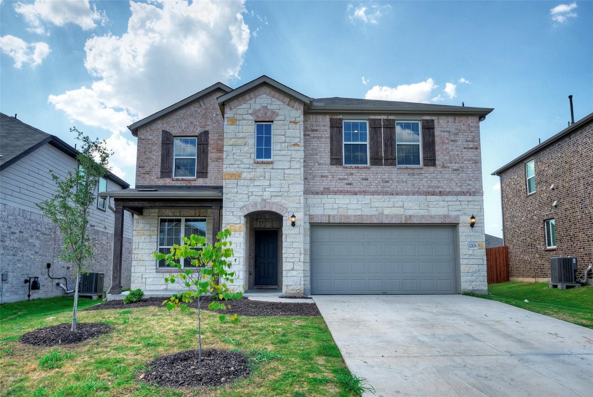 12108 Bacalar BND - property photo 1 - Luxury home in Lagos Ph 3, Manor, TX