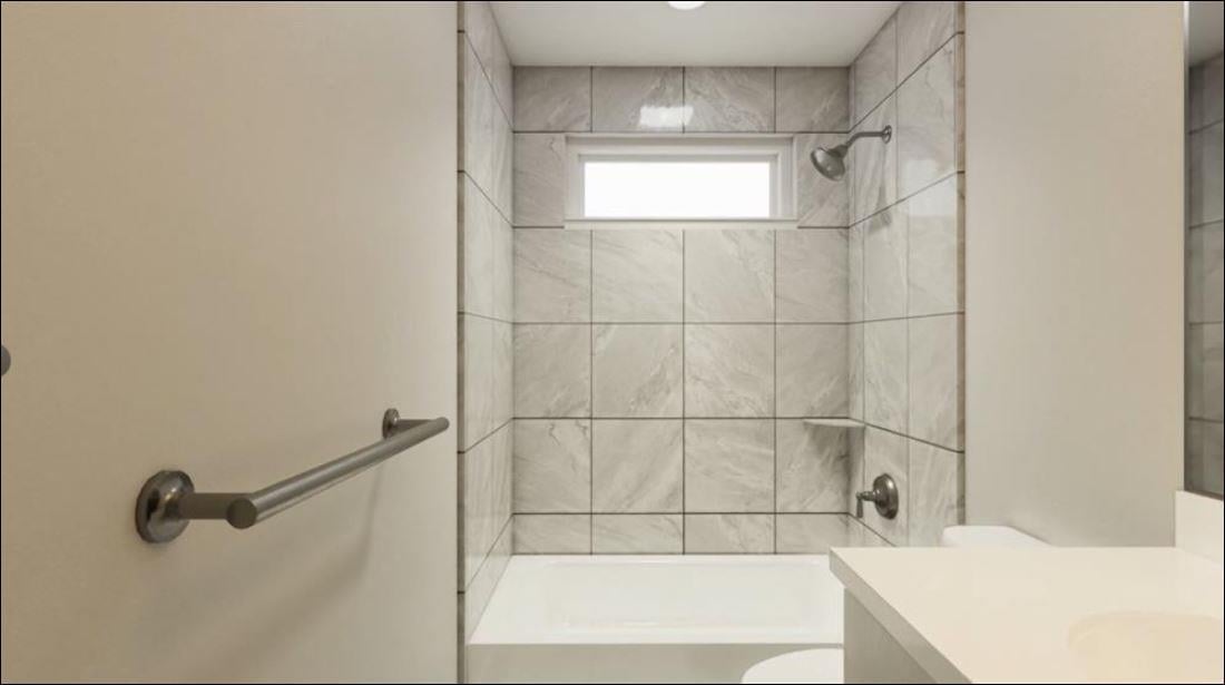 12110 Corsicana Trl Unit #19B - front exterior - Luxury home in ENCLAVE AT LAGOS CONDOMINIUMS, Manor, TX