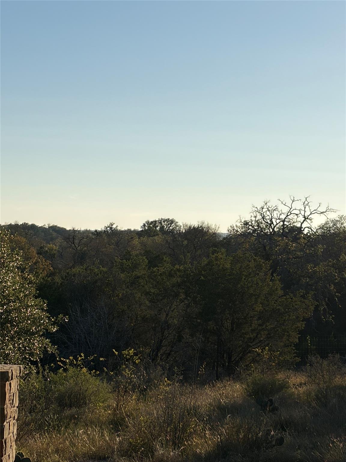 Primary bedroom at 1212 County Road 407 - CATALINA SALINAS, Spicewood, TX