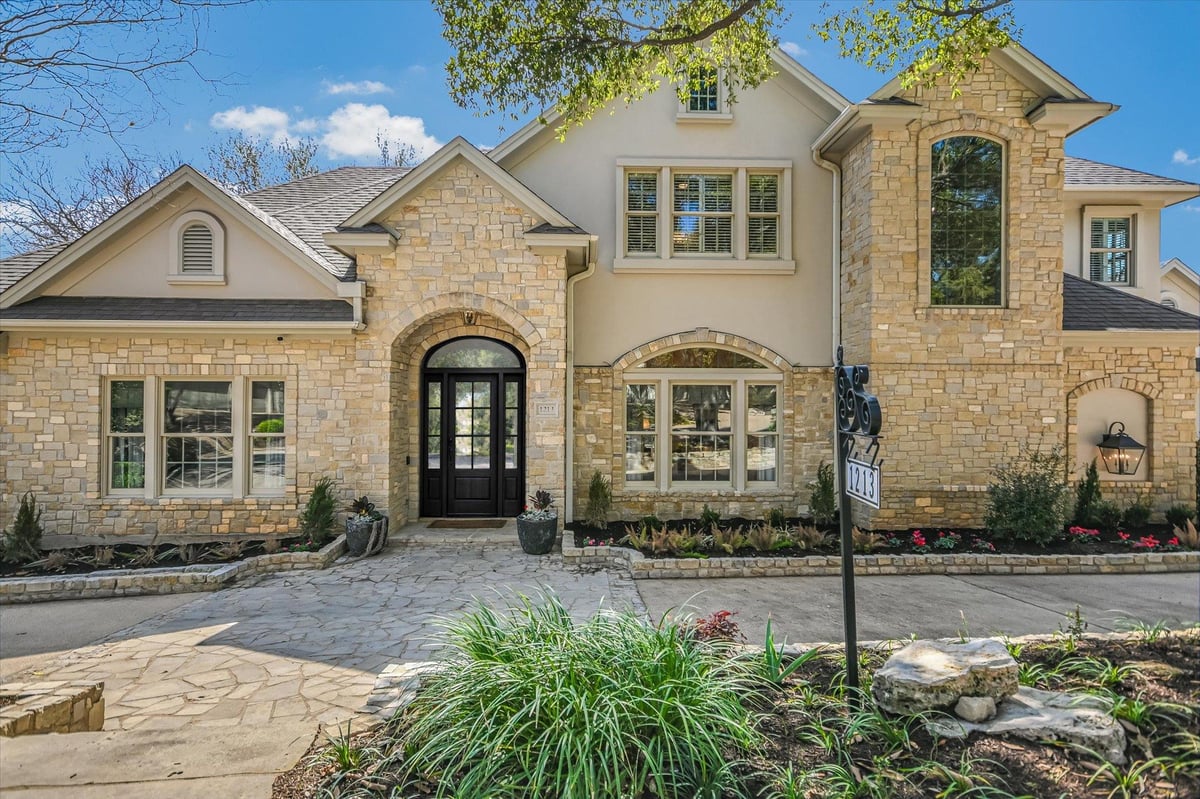View 1213 Havre Lafitte Dr in Treemont Ph B Sec 05 1213 Havre Lafitte Dr - front exterior - Luxury home in Treemont Ph B Sec 05, Austin, TX