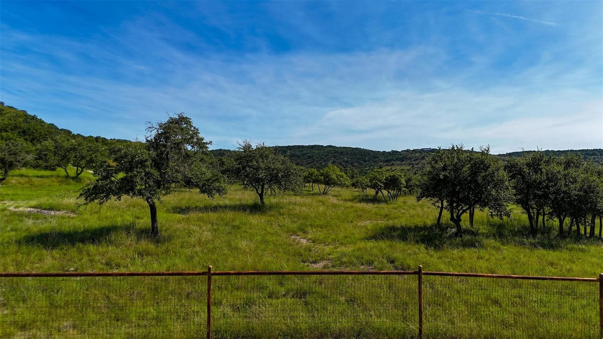 View 1215 Montell Rd in Hill Country Ranches 1215 Montell Rd - front exterior - Luxury lot in Hill Country Ranches, Wimberley, TX