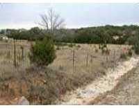 View 12155 Bonham Ranch Rd 12155 Bonham Ranch Rd - front exterior - Luxury lot in Dripping Springs, TX