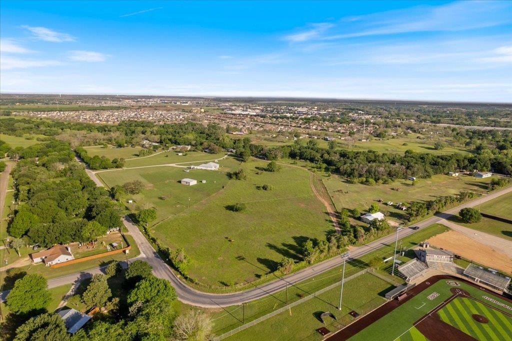 Aerial view with expansive acreage and Hill Country views at 1218  Lovers Ln - Austin, Stephen F, Bastrop, TX