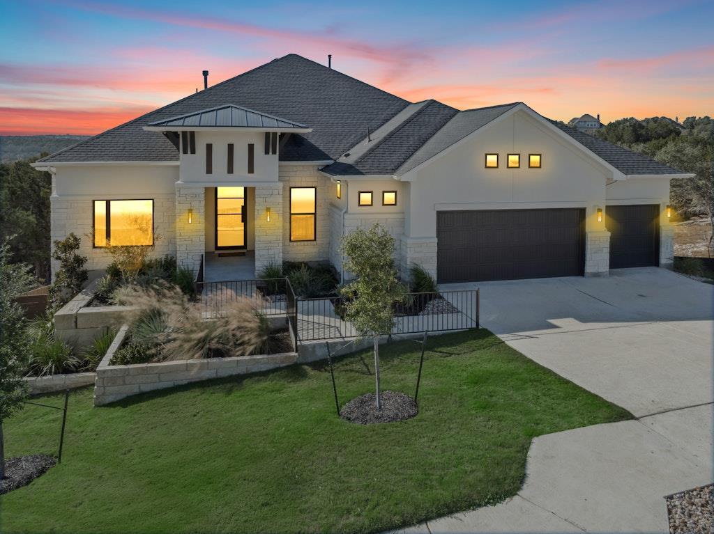 View 1220 Stormy Dr in Riverstone 1220 Stormy Dr - front exterior - Luxury home in Riverstone, Georgetown, TX