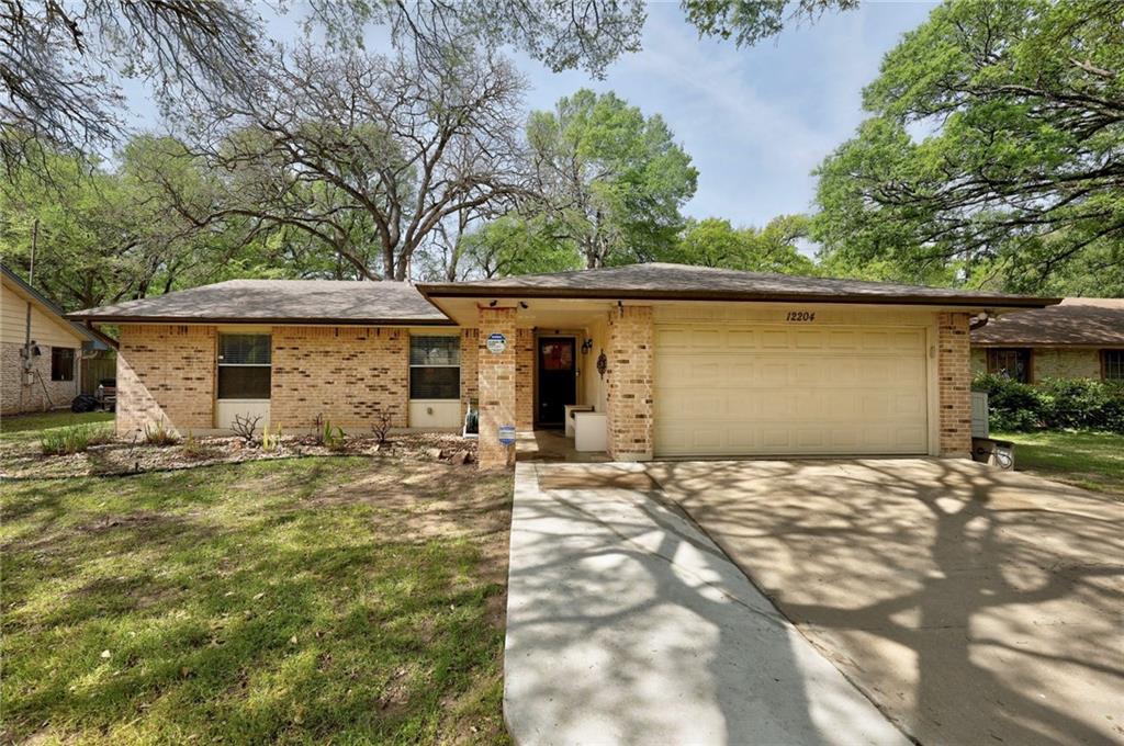 View 12204 Waxwing Cir in Woodland Village Anderson Mill Sec 01 Blk 12204 Waxwing Cir - front exterior - Luxury home in Woodland Village Anderson Mill Sec 01 Blk, Austin, TX