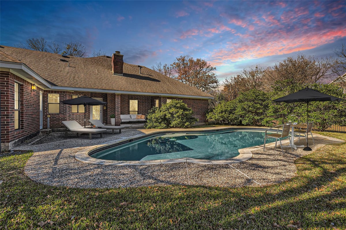 12205 Corner Brook Pass - front exterior - Luxury home in Shady Hollow Estates Sec 01, Austin, TX