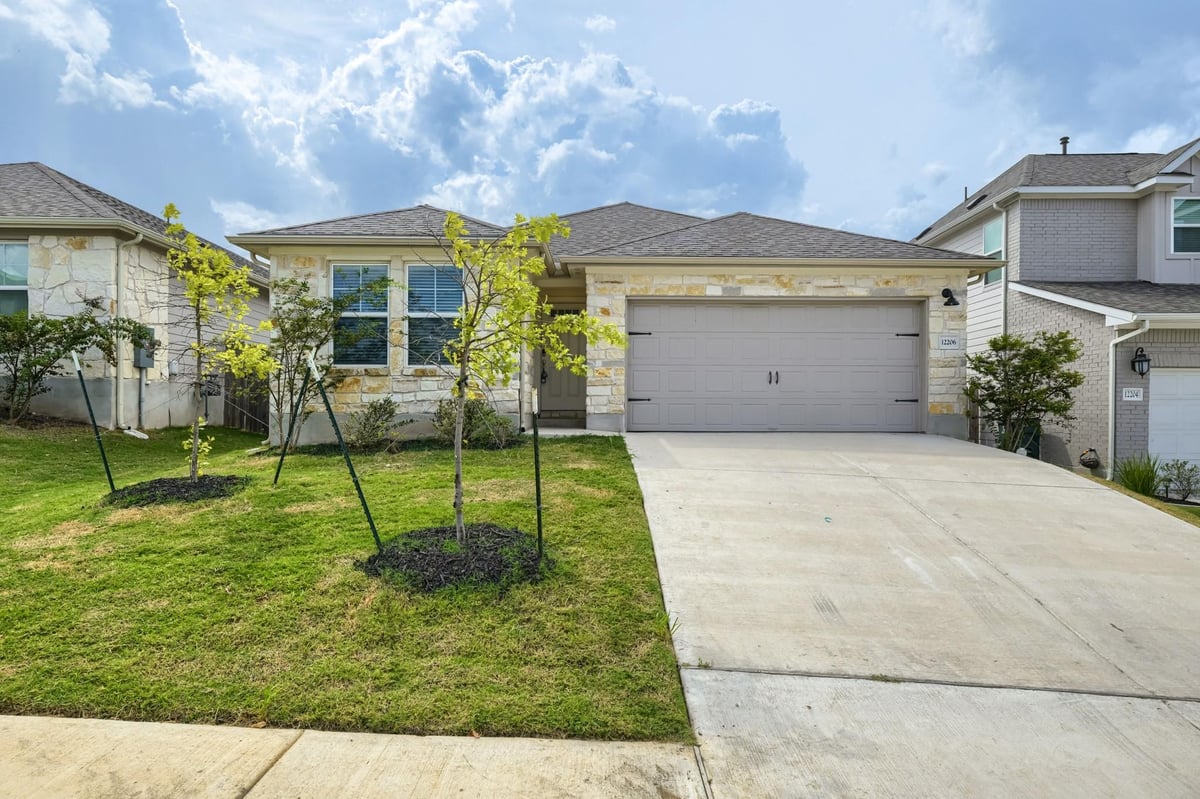 View 12206 Purple Prairie LN in Turners Xing North Ph 2 12206 Purple Prairie LN - property photo 1 - Luxury home in Turners Xing North Ph 2, Buda, TX