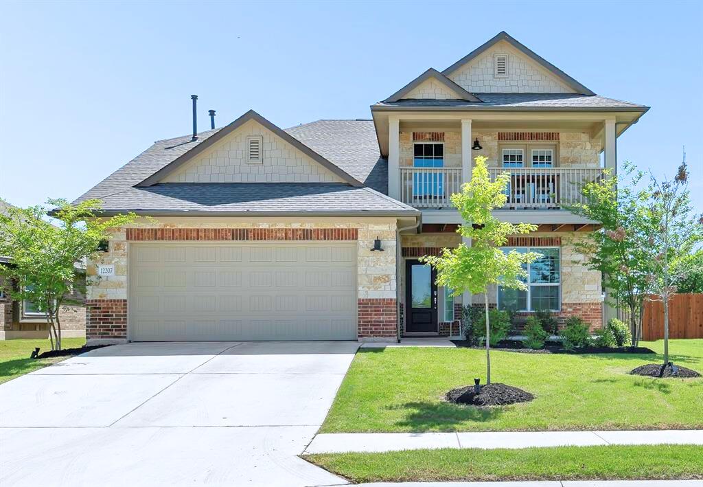 12207 Coronilla Bnd - front exterior - Luxury home in ENCLAVE AT ESTANCIA CONDOMINIUMS, Austin, TX