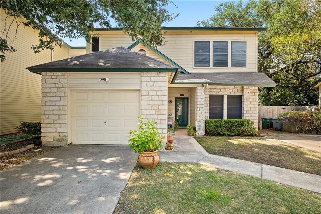 View 12212 Brigadoon Ln Unit #114 in Brigadoon Twnhms Ph 04 12212 Brigadoon Ln Unit #114 - front exterior - Luxury home in Brigadoon Twnhms Ph 04, Austin, TX