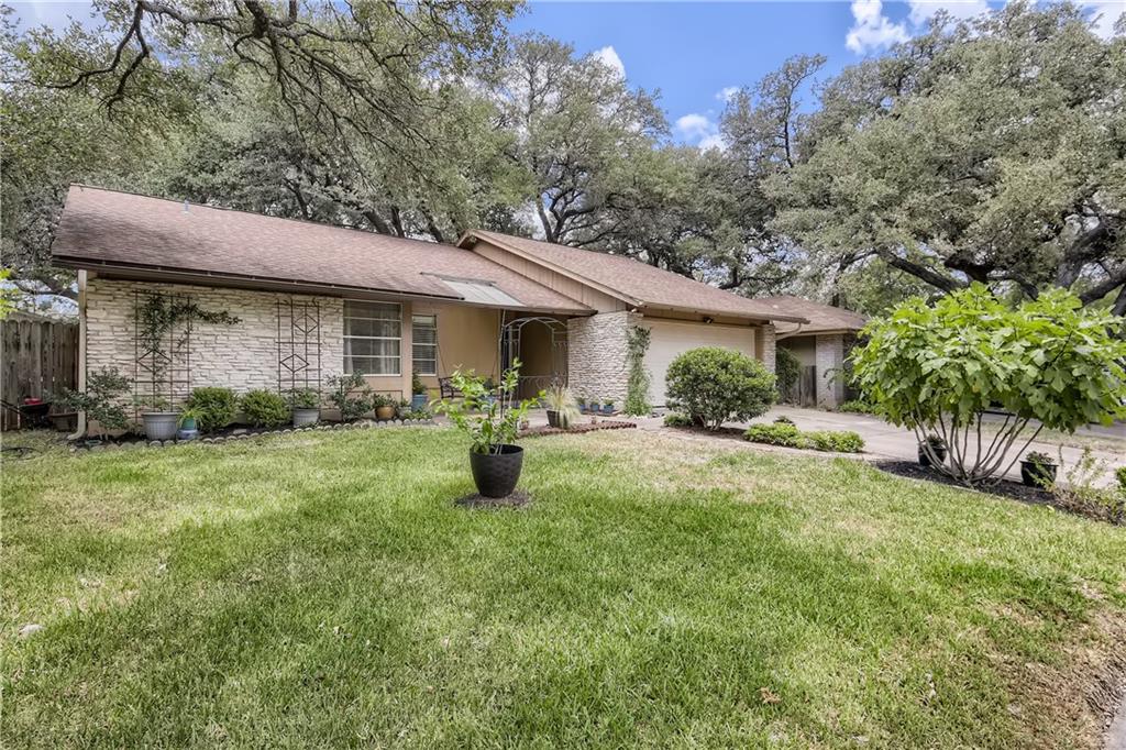 12214 Old Stage Trl - front exterior - Luxury home in Village 01 At Anderson Mill, Austin, TX