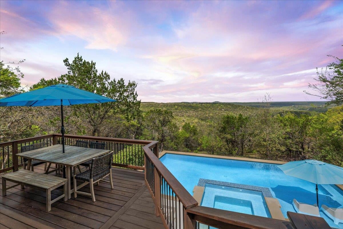 View 12221 Lake Stone DR in Lake Pointe Sec 05 12221 Lake Stone DR - front exterior - Luxury home in Lake Pointe Sec 05, Austin, TX